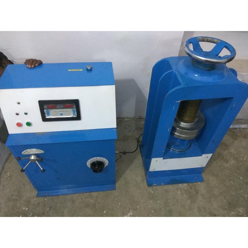 COMPRESSION TESTING MACHINE